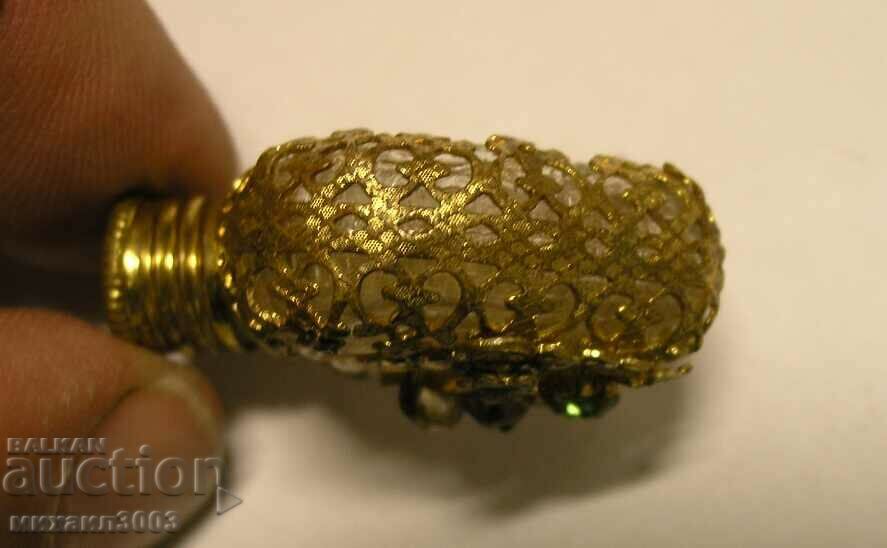 Antique perfume bottle with openwork decoration with price 29.00 BGN | € 14.83