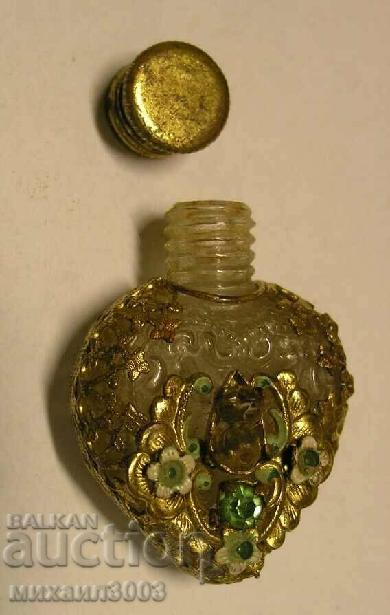 Delivery of Antique perfume bottle with openwork decoration