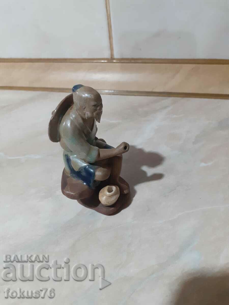 Old small figurine figurine