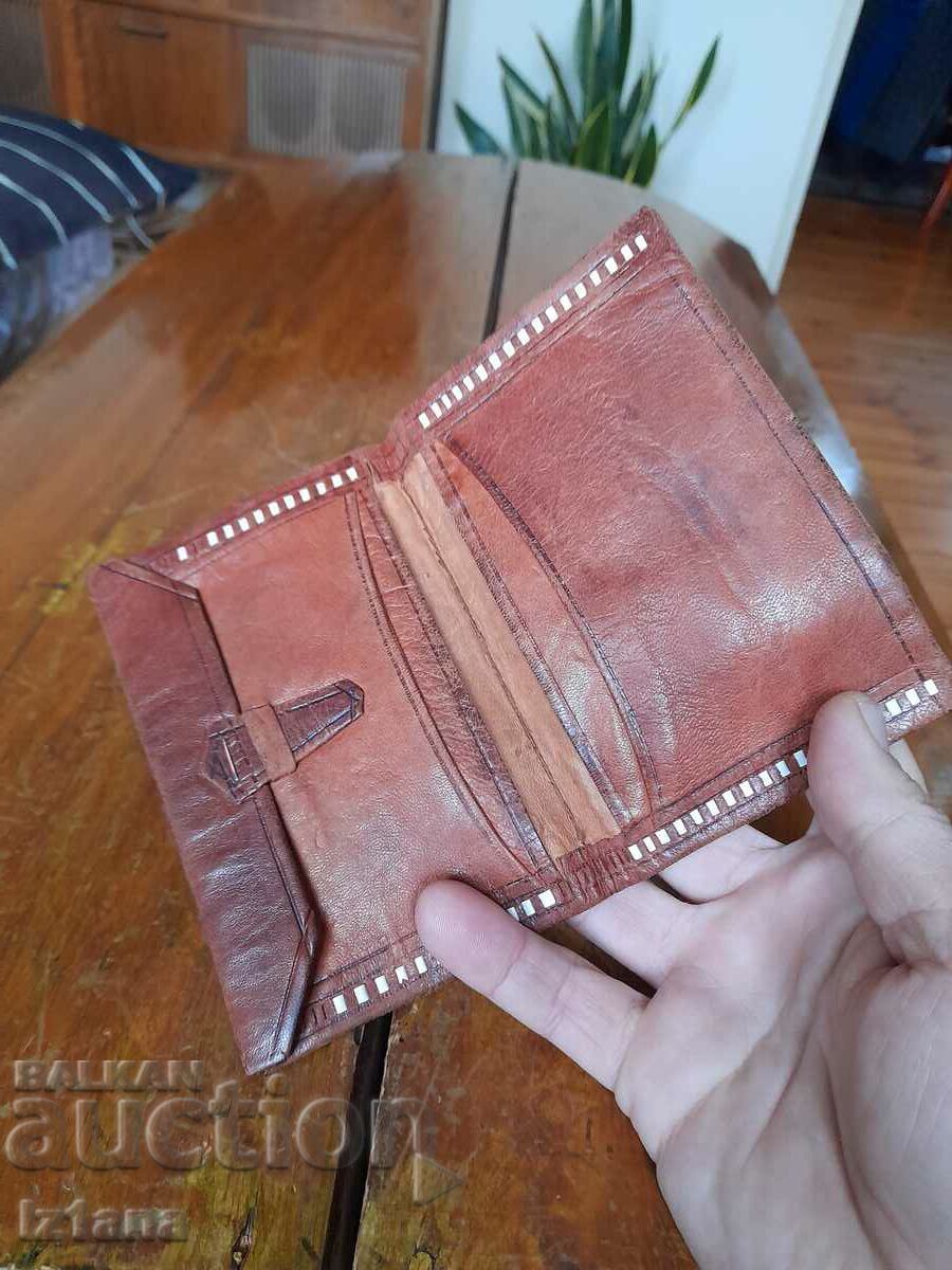 Delivery of Old leather wallet, purse