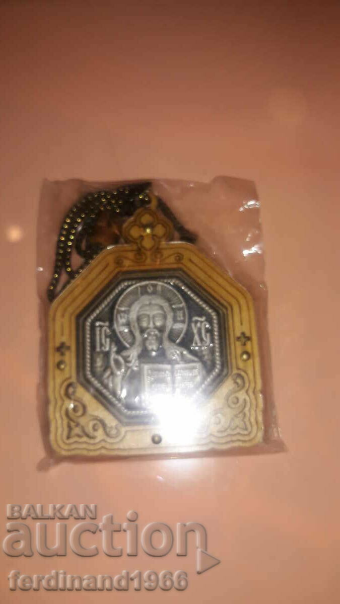 A small wooden icon of Jesus Christ