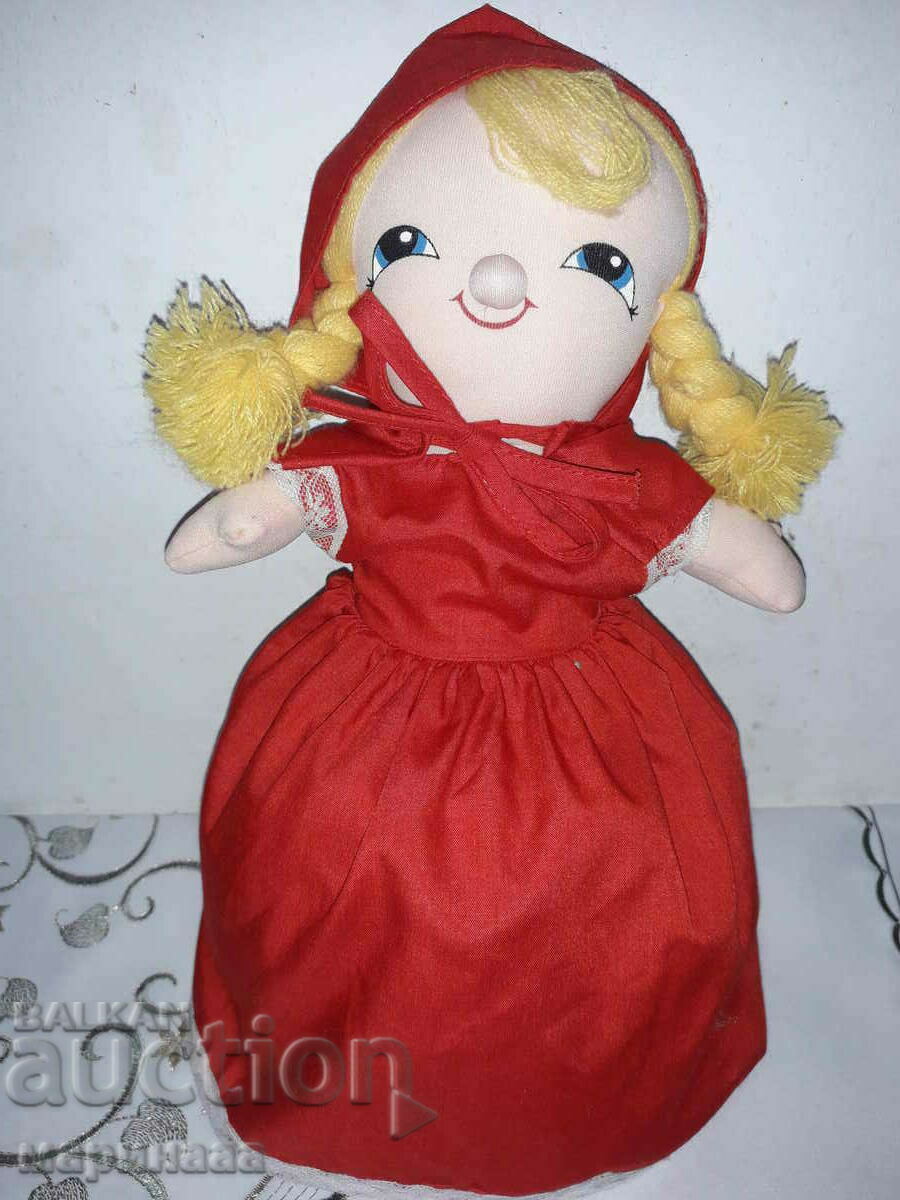 3 -faced doll ('' Red Riding Hood '')