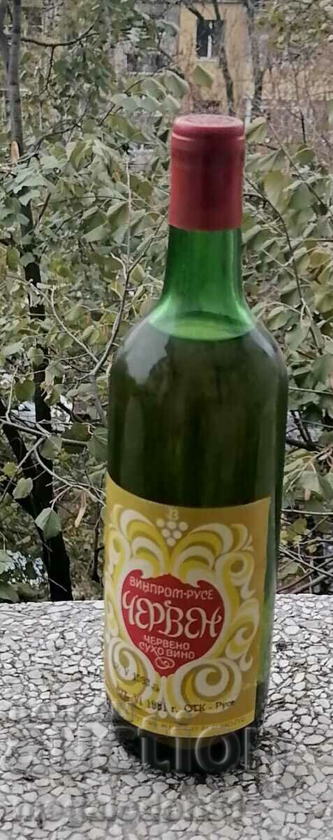 Old bottle of red dry wine "Cherven"