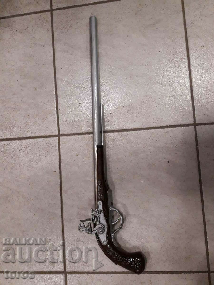 Flintlock rifle, pistol, pistol Flintlock rifle, pistol, pistol