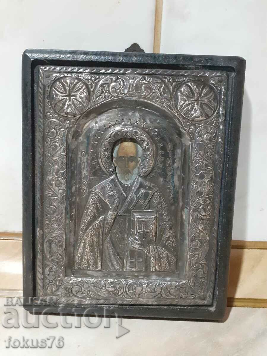 Old silver icon with certificate St. Nicholas