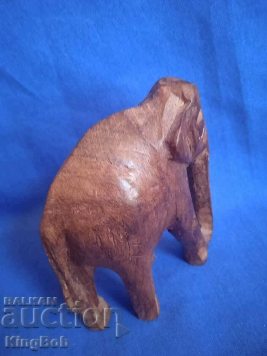 WOODEN FIGURINE OF AN ELEPHANT - 5 WOODEN FIGURINE OF AN ELEPHANT - 5