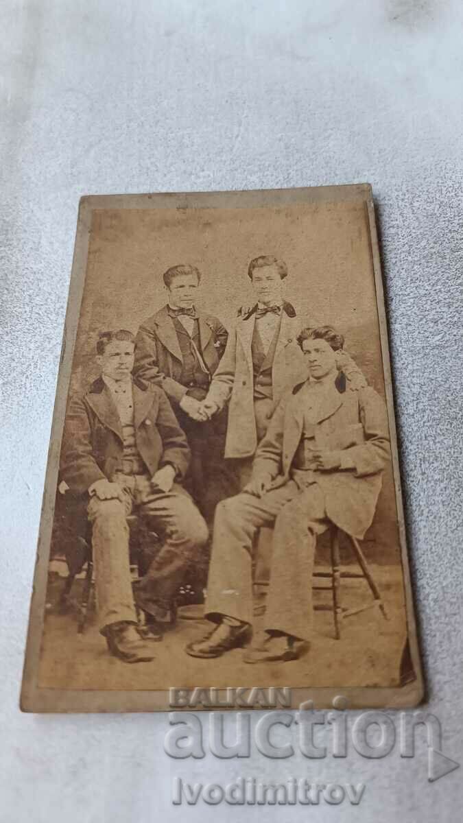 Photo Four young men Cardboard