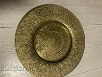Bronze plate richly decorated peacock