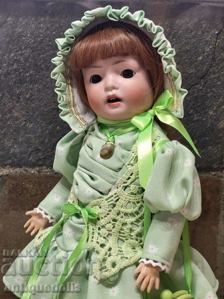 Antique Schoenau & Hoffmeister doll, 38 cm (15 in) tall