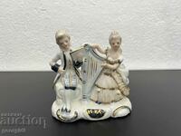 German porcelain figure of musicians. #4831