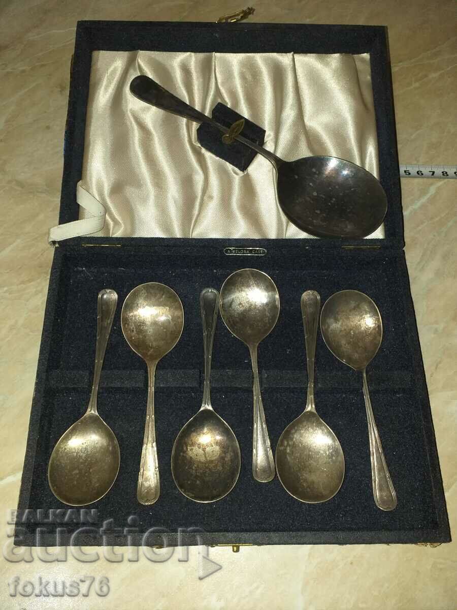 Set of old silver plated English spoons in a box
