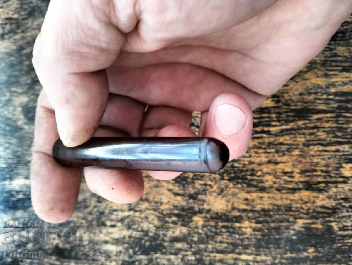 Auction An old amber cigarette Auction An old amber cigarette