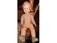 Old doll with celluloid head