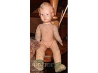 Old doll with celluloid head