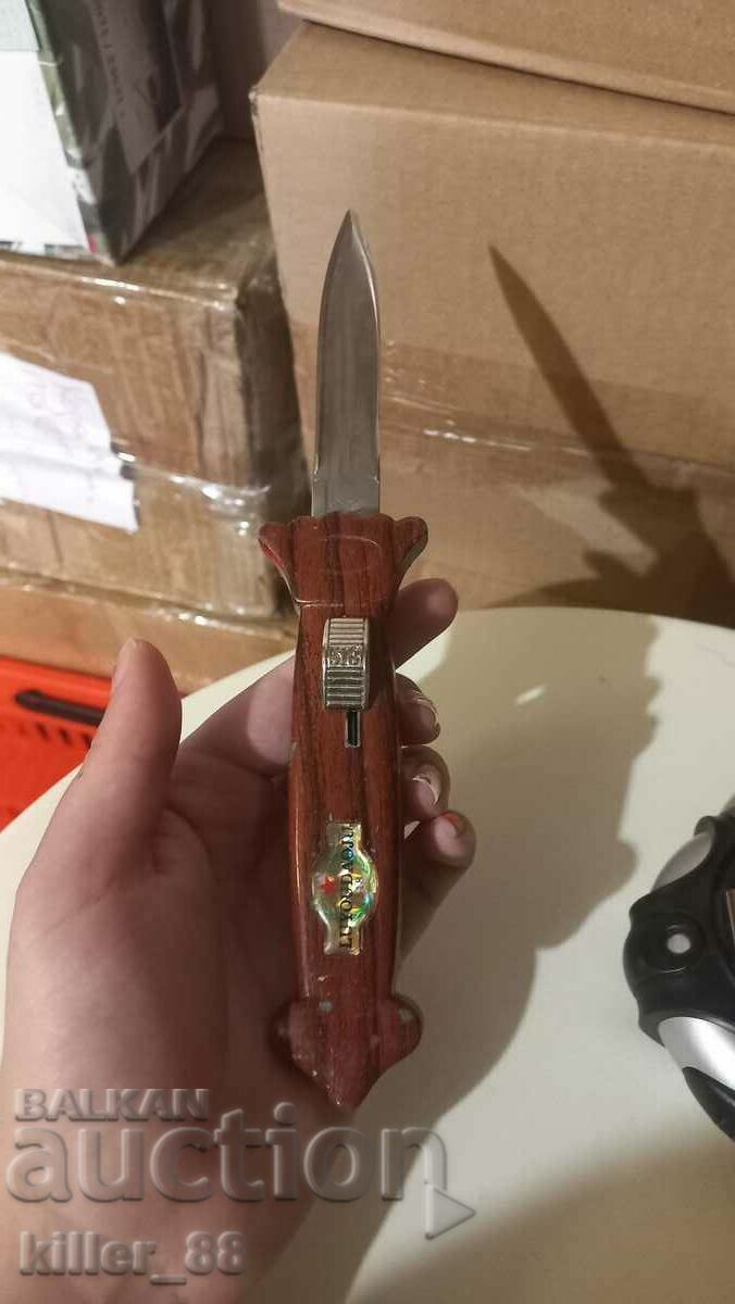 Knife that spits out the blade Olympiad