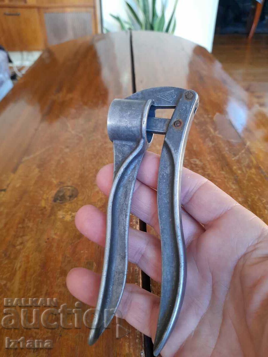 Old aluminum garlic press with price 15.00 BGN | € 7.67 Old aluminum garlic press with price 15.00 BGN | € 7.67