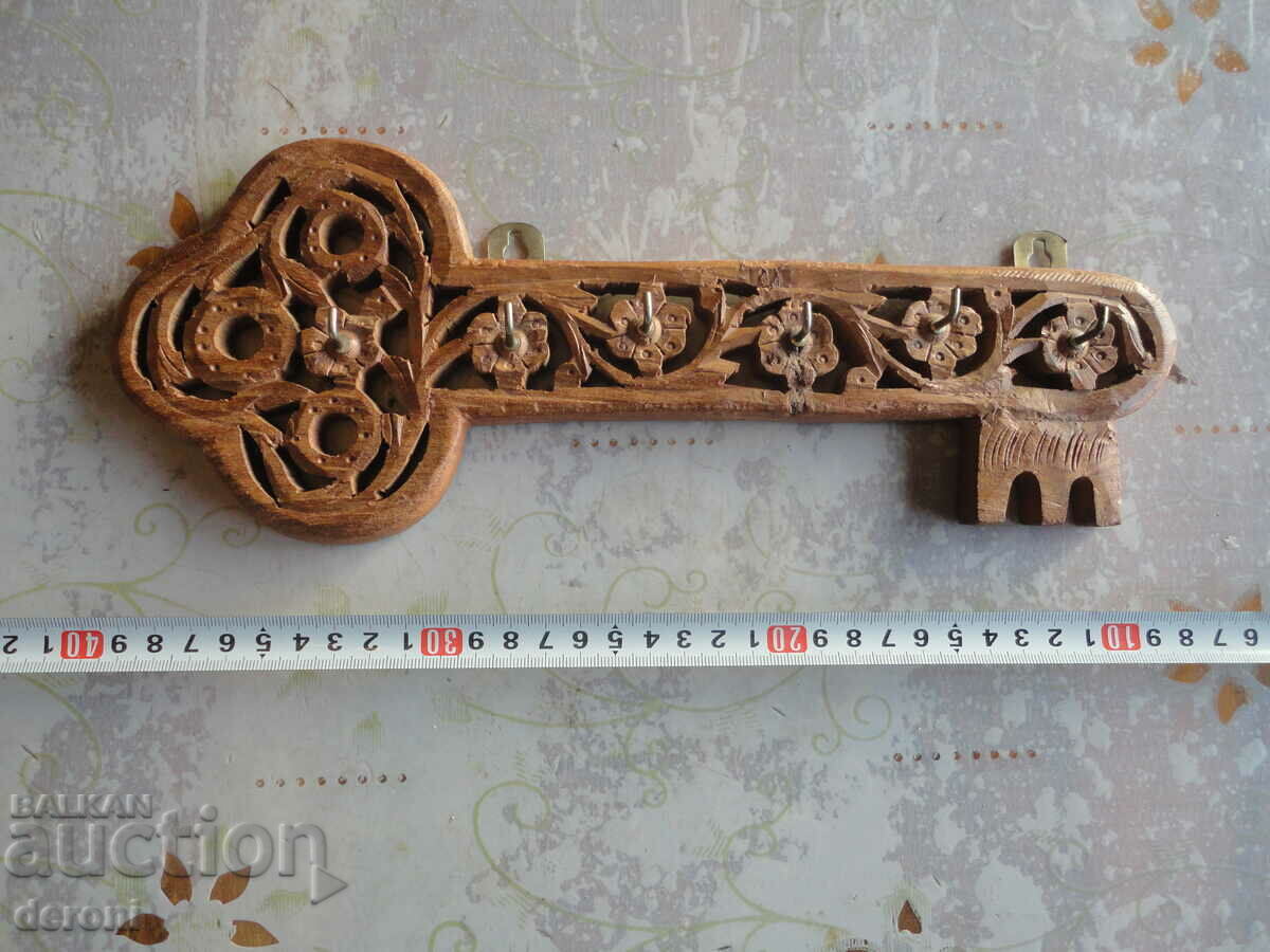 Unique openwork wood carving key holder
