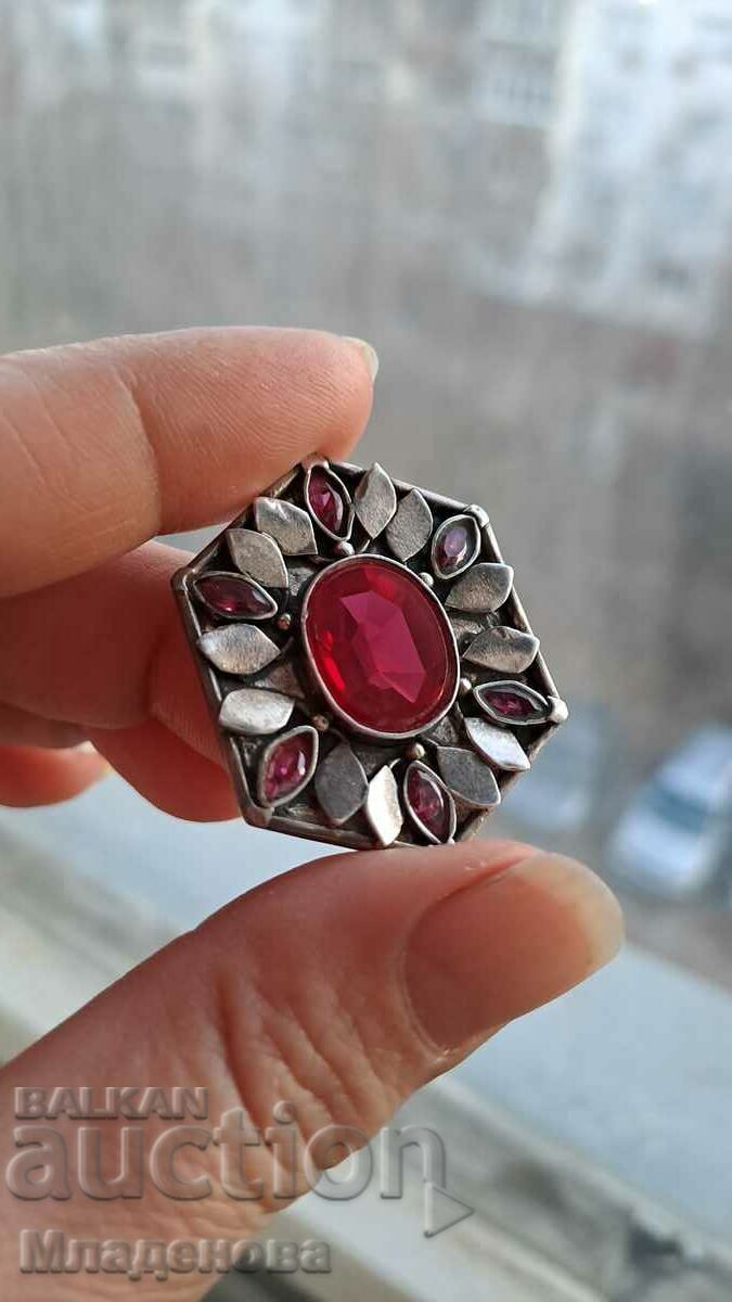 Silver brooch with rubies