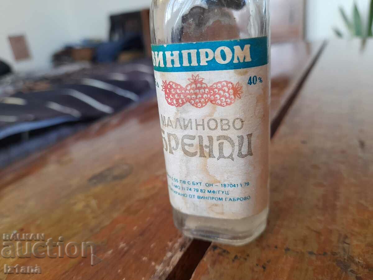 Auction An old bottle of Raspberry Brandy Auction An old bottle of Raspberry Brandy