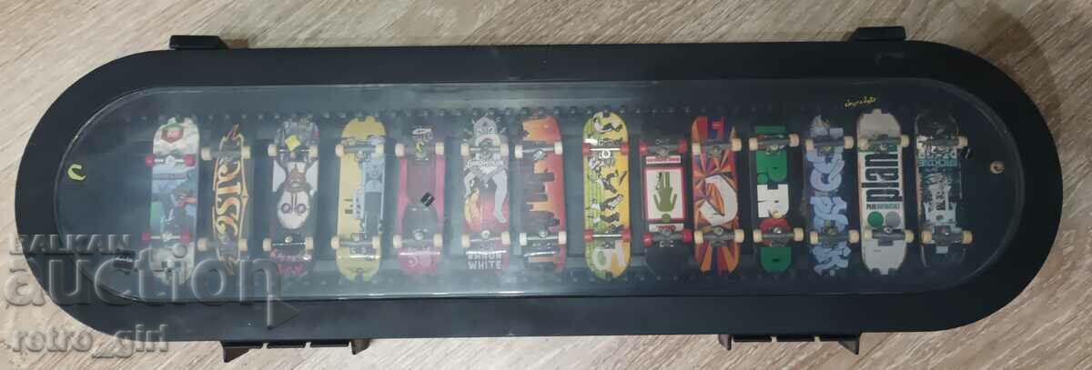 Auction Lot of "Tech Deck", 14 pieces together with their collection box. Auction Lot of "Tech Deck", 14 pieces together with their collection box.