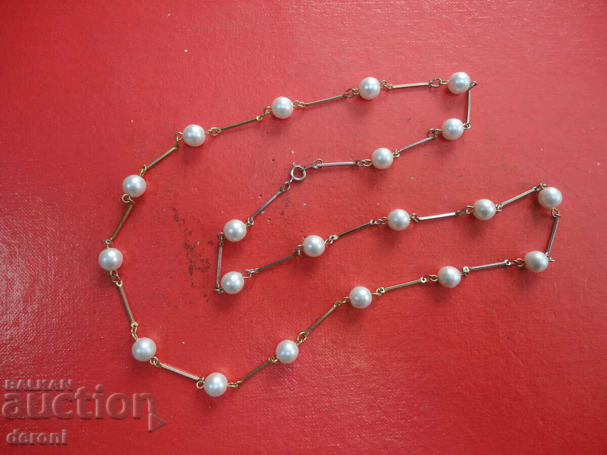 Auction  Great pearl necklace