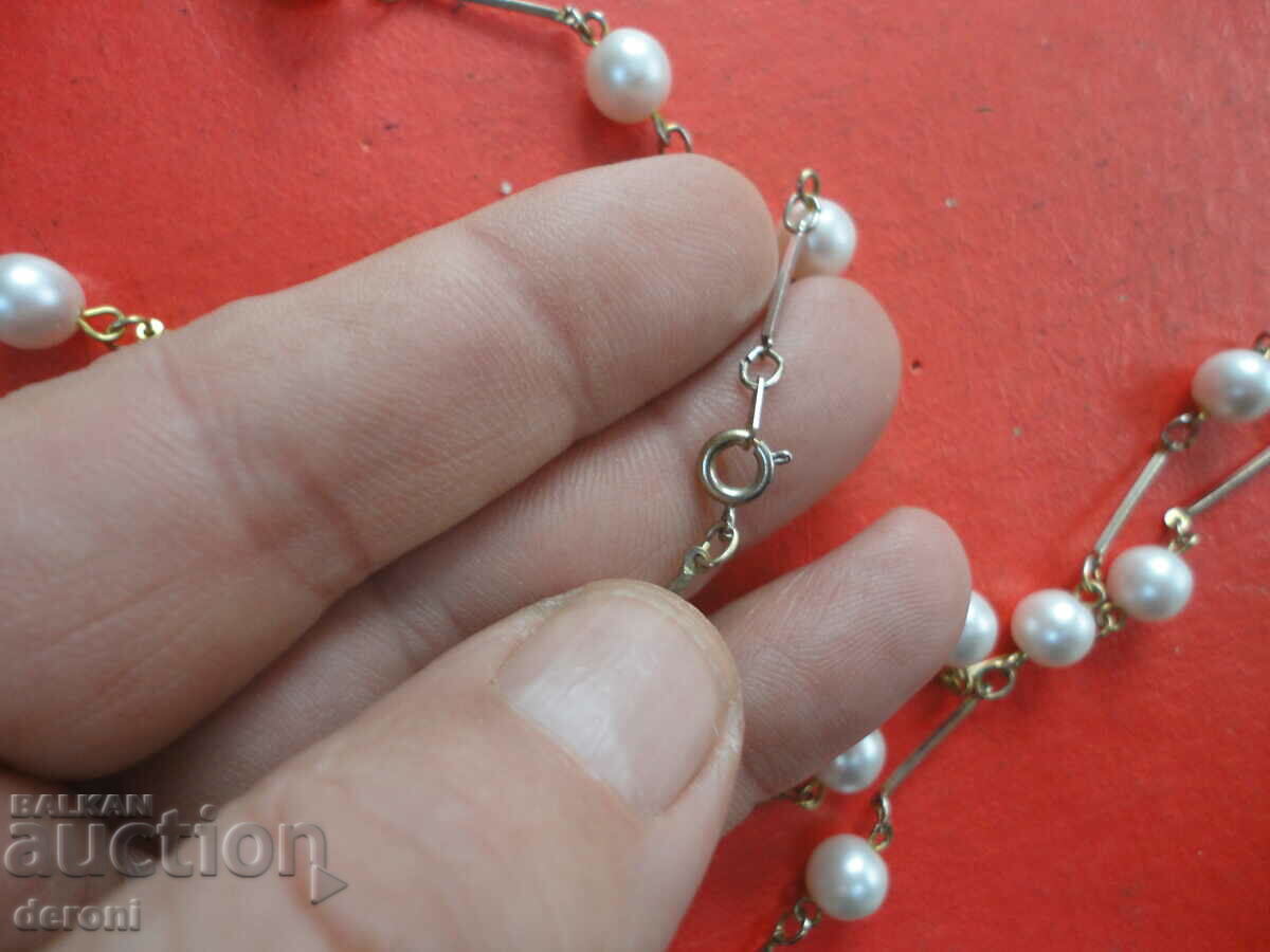 Delivery of Great pearl necklace