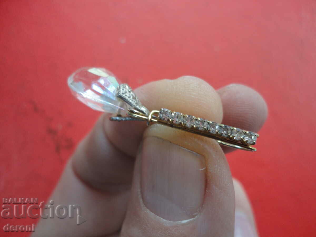 Delivery of Silver locket with brooch