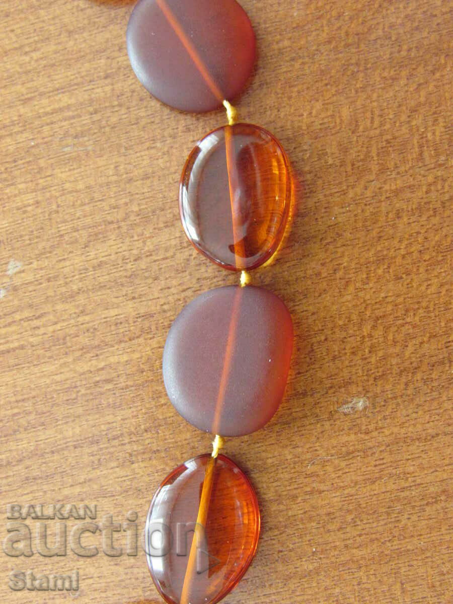 Women's oval necklace made of premium Baltic amber with price 70.00 BGN | € 35.79 Women's oval necklace made of premium Baltic amber with price 70.00 BGN | € 35.79