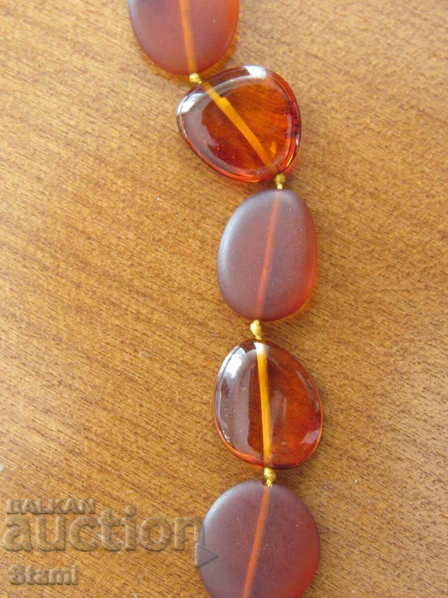Auction Women's oval necklace made of premium Baltic amber Auction Women's oval necklace made of premium Baltic amber