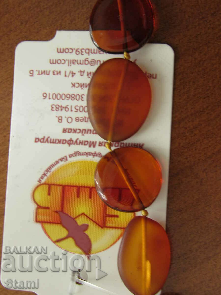 Delivery of Women's oval necklace made of premium Baltic amber Delivery of Women's oval necklace made of premium Baltic amber