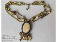 Ancient ethnic necklace, bone, bronze, stones, beads