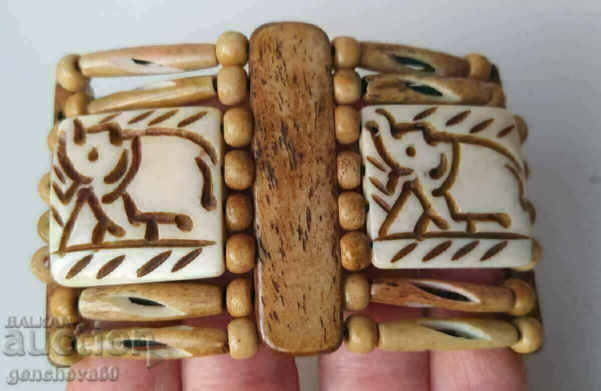 Wide bone bracelet with elephant carving with price 12.00 BGN | € 6.14