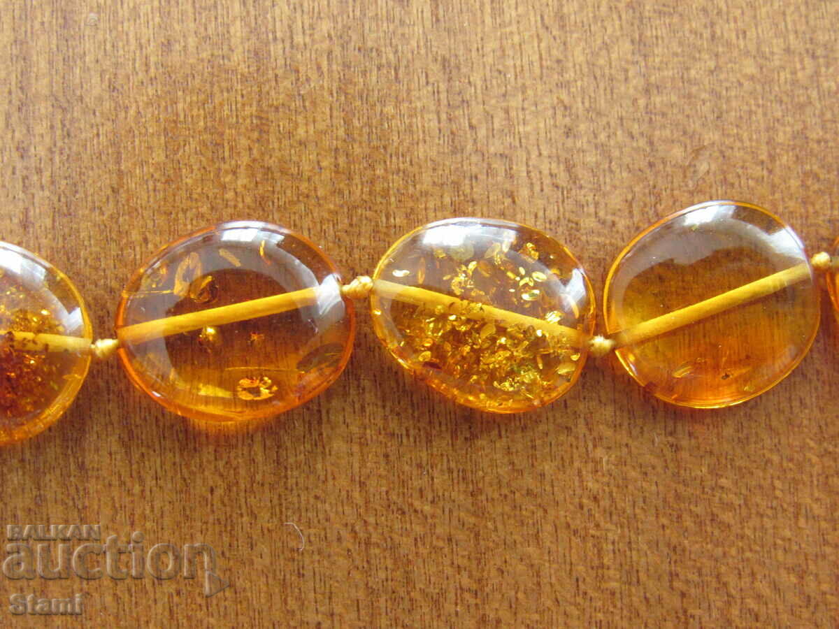 Women's circle necklace made of premium Baltic amber with price 63.00 BGN | € 32.21 Women's circle necklace made of premium Baltic amber with price 63.00 BGN | € 32.21