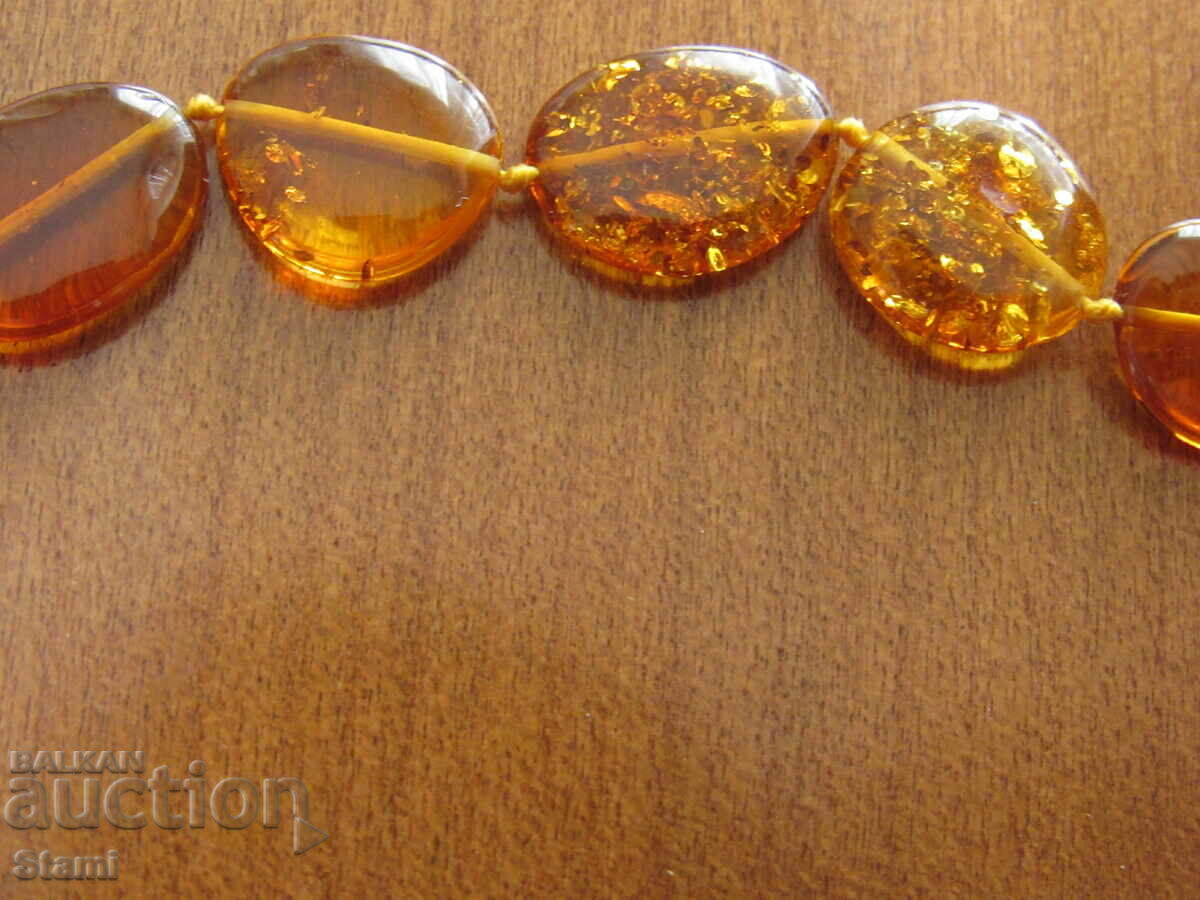 Delivery of Women's circle necklace made of premium Baltic amber Delivery of Women's circle necklace made of premium Baltic amber