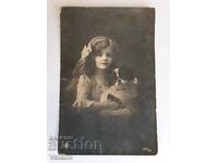 Postcard Girl with a puppy 1917