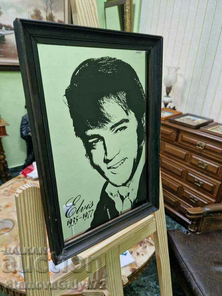 A wonderful antique collectible Elvis advertising mirror