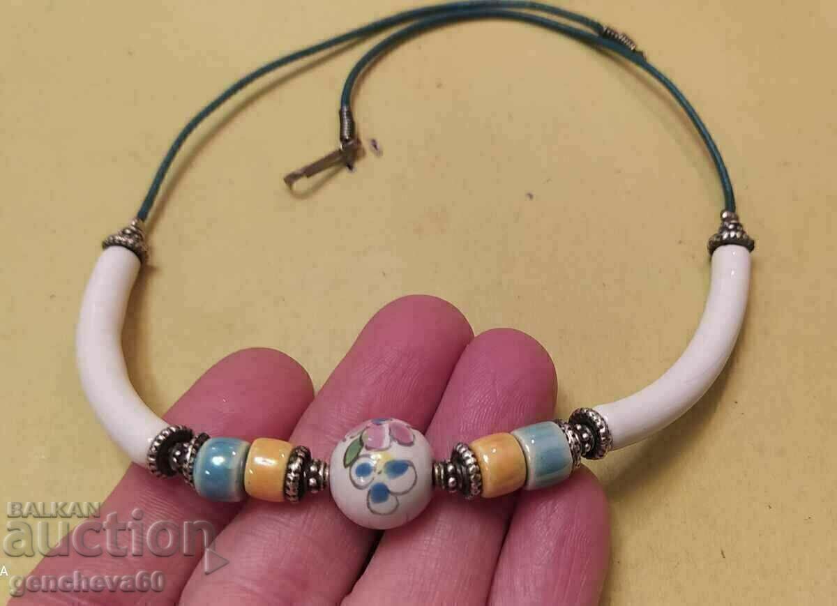 Delivery of Unique necklace painted porcelain and silver elements Delivery of Unique necklace painted porcelain and silver elements