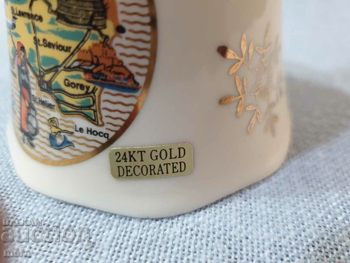 Auction  Porcelain bell with 24 carat gold plating