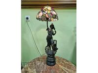 A lovely antique large French figure lamp