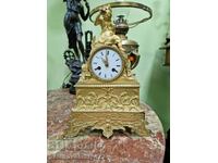A lovely antique French bronze mantel clock