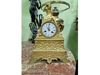 A lovely antique French bronze mantel clock