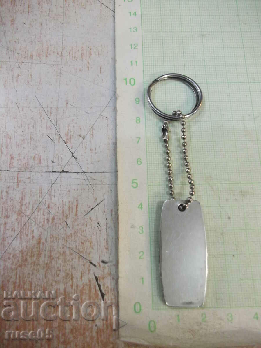 Delivery of "MAD HAT" keychain