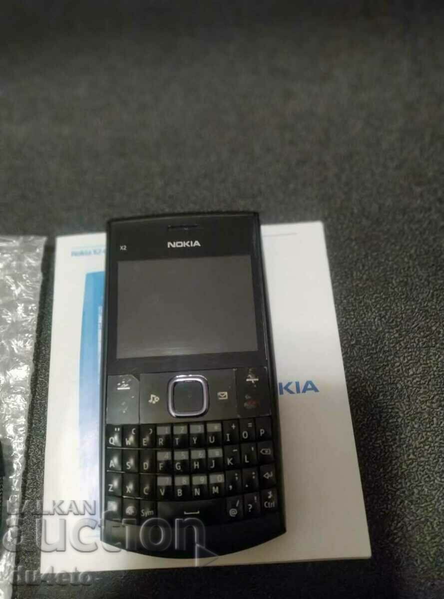 Телефон Nokia X2-01 QWERTY-клавиатура, microSD, Bluetooth. К