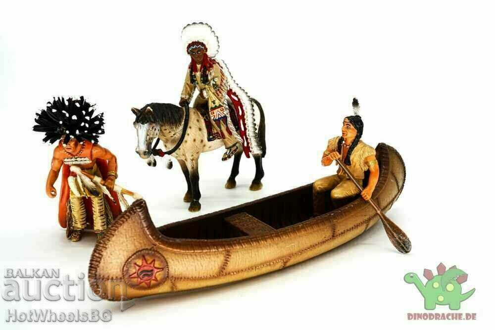Model / Jucărie din indianul „Schleich” cu o canoe