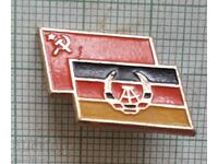Badge - The flags of the USSR and the GDR