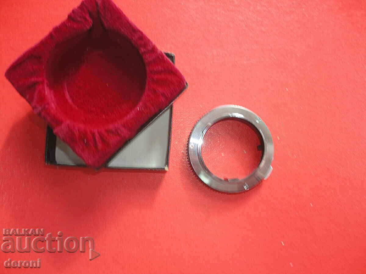 Adapter ring for lens in box