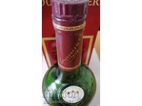 Old empty Napoleon Courvoisier cognac bottle