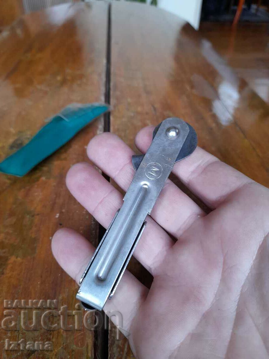 Old can and bottle opener with price 20.00 BGN | € 10.23