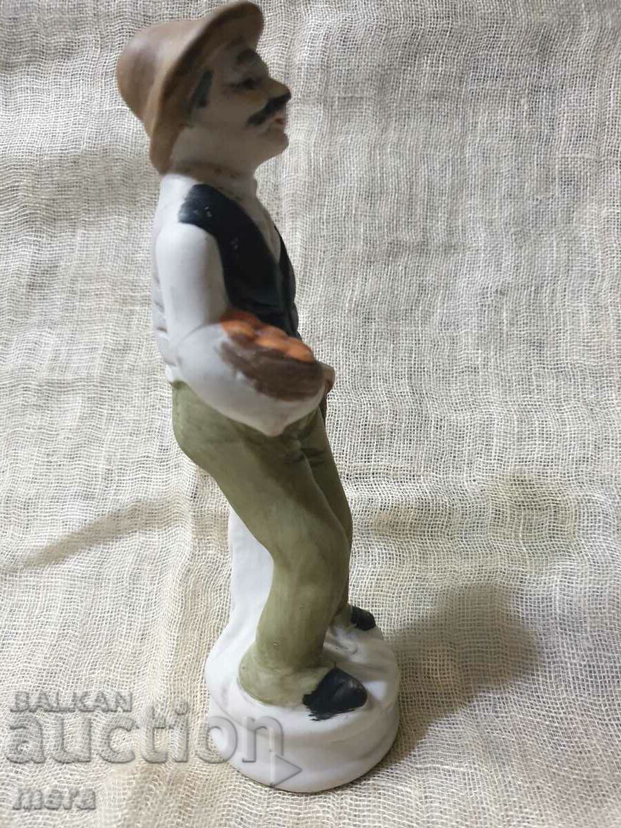 Porcelain figurine of an old man with price 15.00 BGN | € 7.67