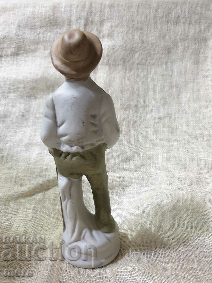 Delivery of Porcelain figurine of an old man